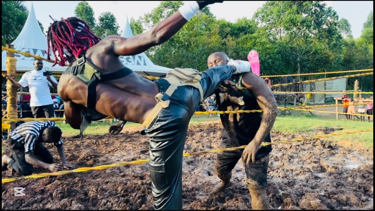 2 on 1 match, Africa soft ground wrestling tough competition!! #africa #wrestling #sgw #sports #fyp background