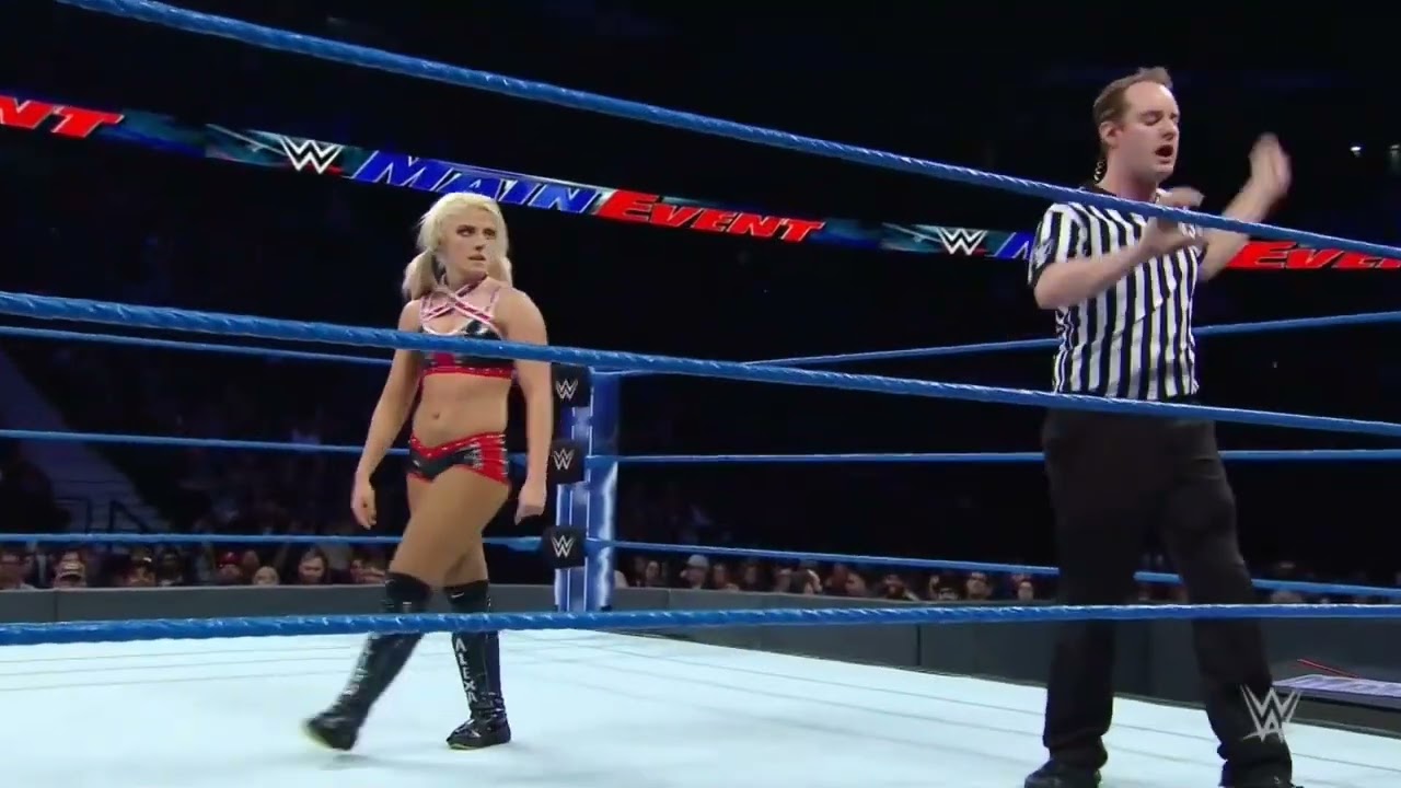 ALEXA BLISS VS. NAOMI (WWE MAINEVENT) background