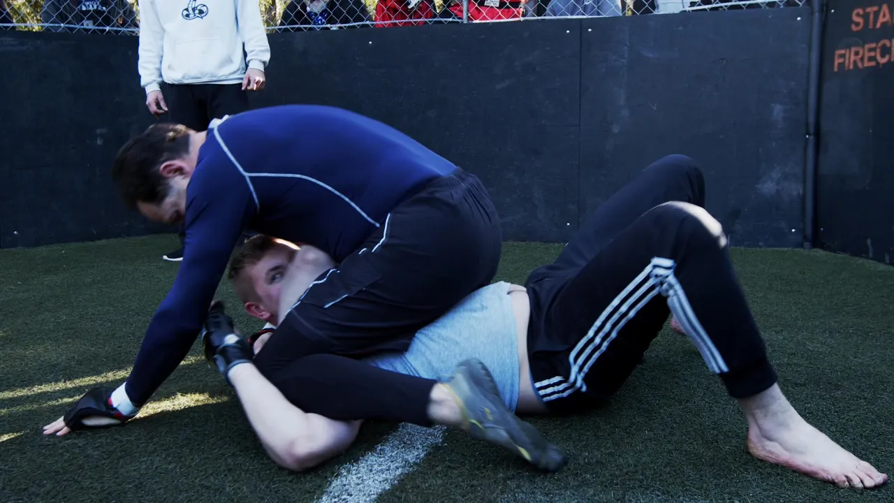 Grandpa takes an MMA match in a Cage! doesn't end well background