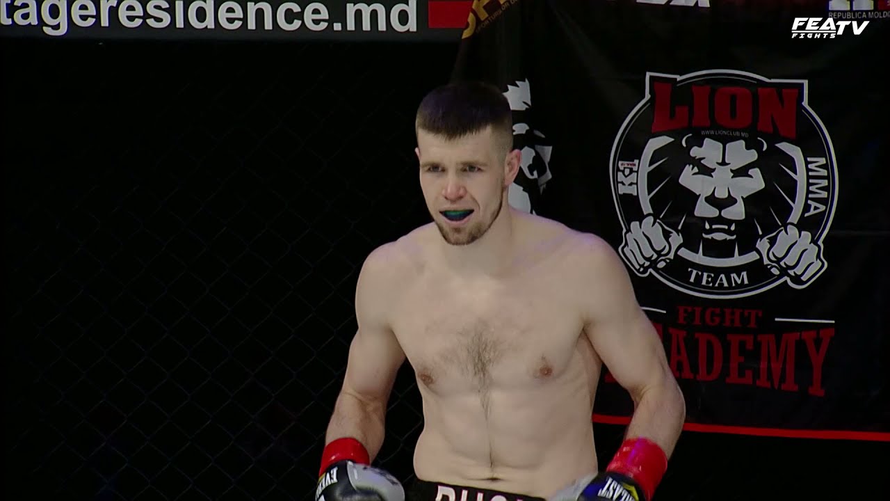 Constantin Rusu vs Mina Manoli. Welterweight bout. FEA RESET 13.03.2021 background