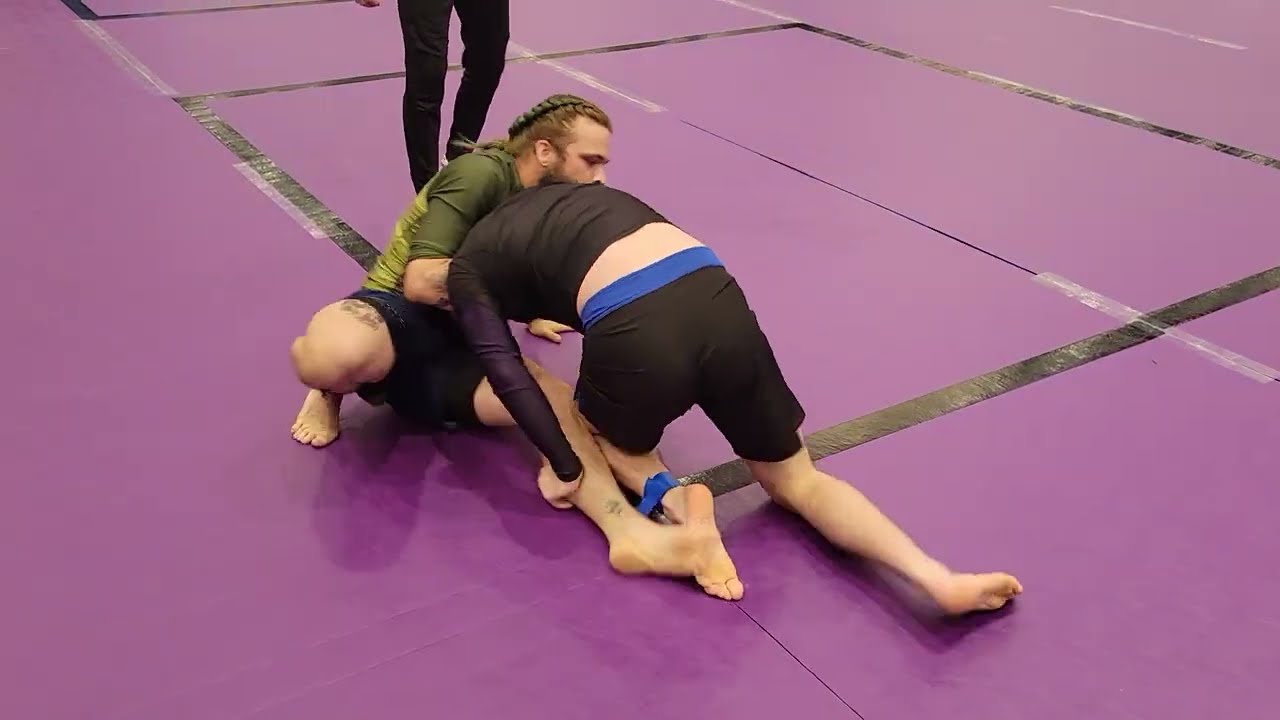 Jumping entry into high elbow guillotine choke. NO Gi BJJ match Holy City Sub Series March 2023