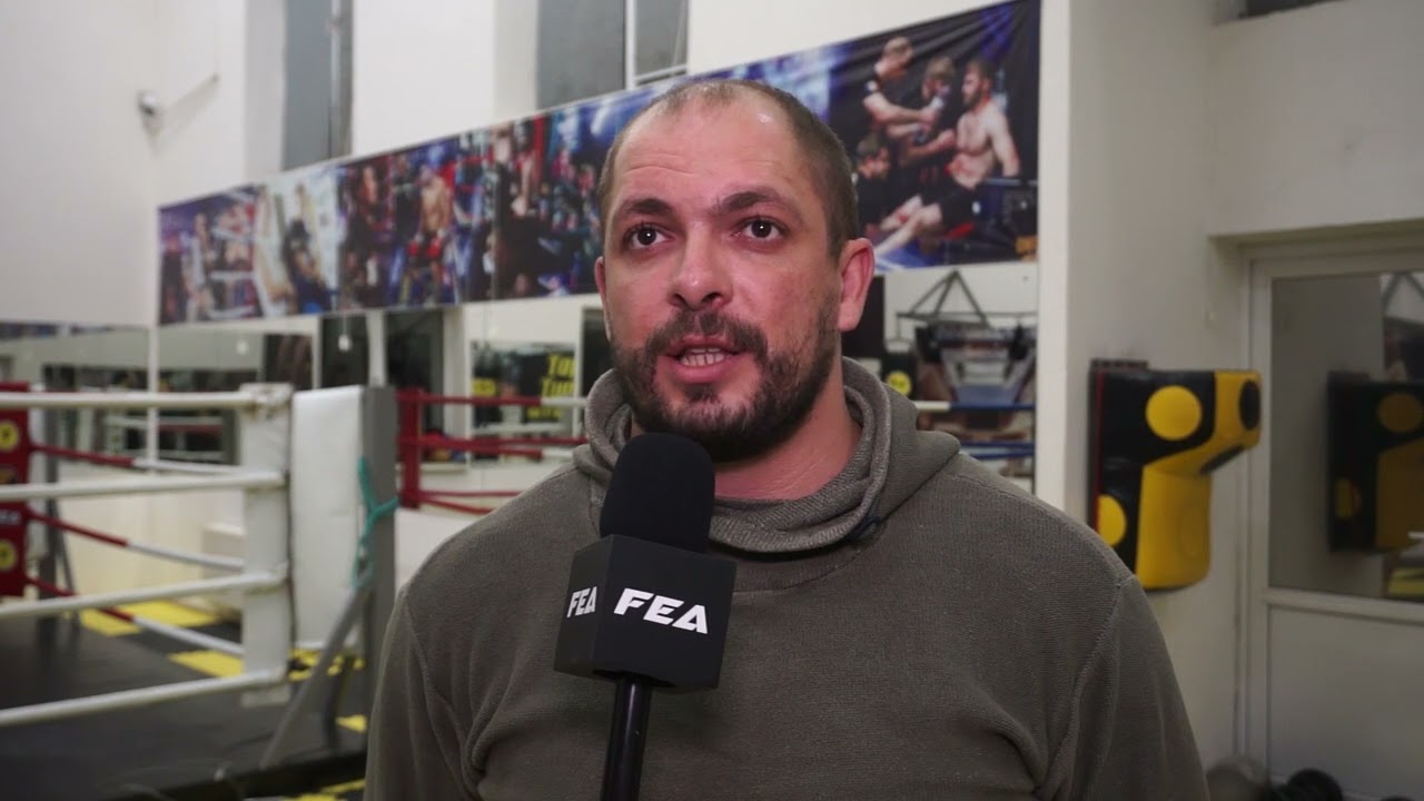 Pre-fight statements: Ion Chirilov and coach, Vladislav Belinschi . background