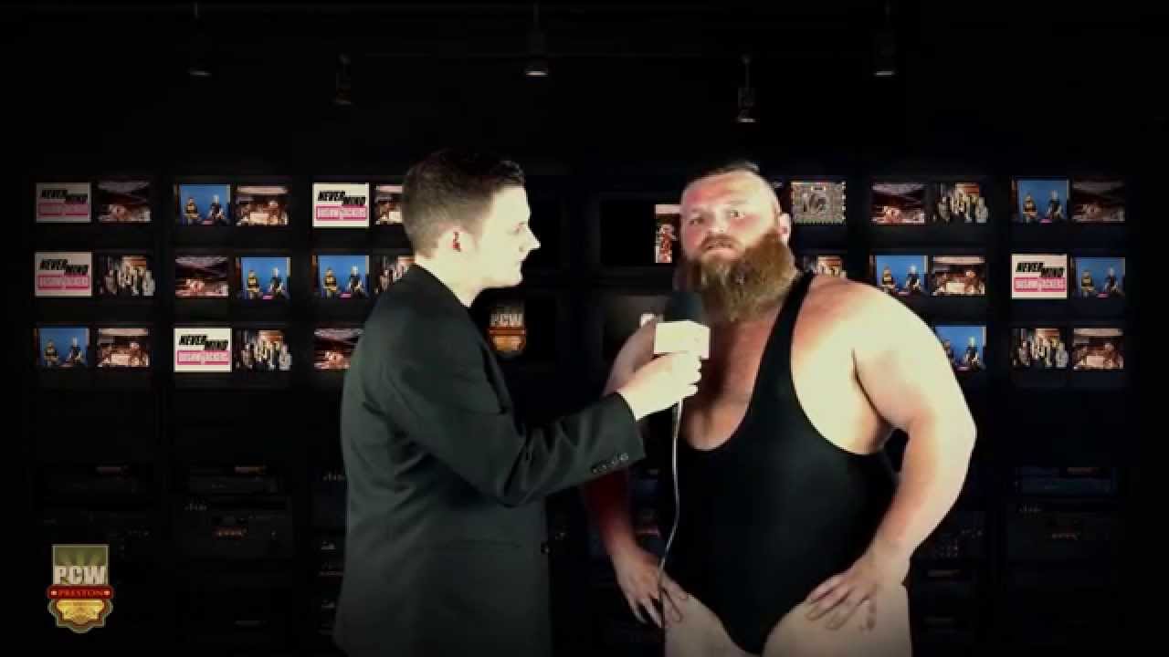 Battered but Victorious, Dave Mastiff defeats Low Ki background