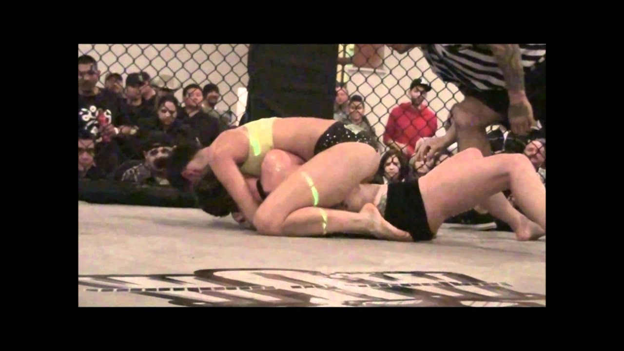 5150 Fightwear Presents - W.O.W - Courtney VS Cynthia (Oil Wresting) background
