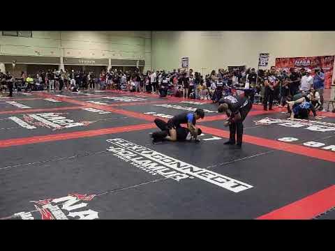 Entertaining Juniors Match. With Some Unortadox Movement And High Energy. background