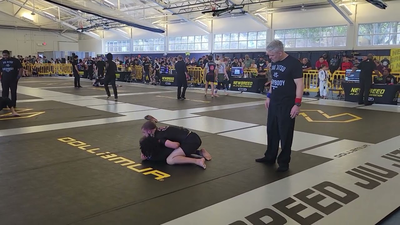 Dude Racks Up Takedowns In BJJ No Gi Match backdrop