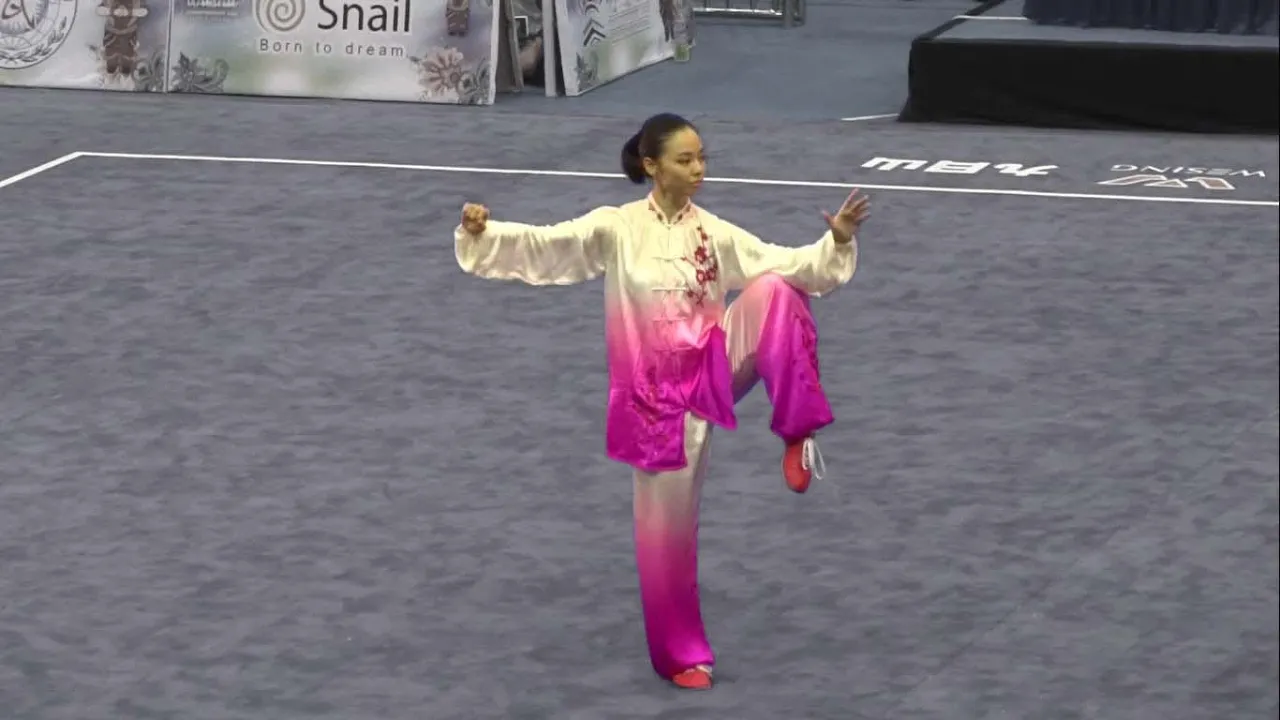 13th World Wushu Championships, Women Taijiquan INA Lindswell 9.70 backdrop