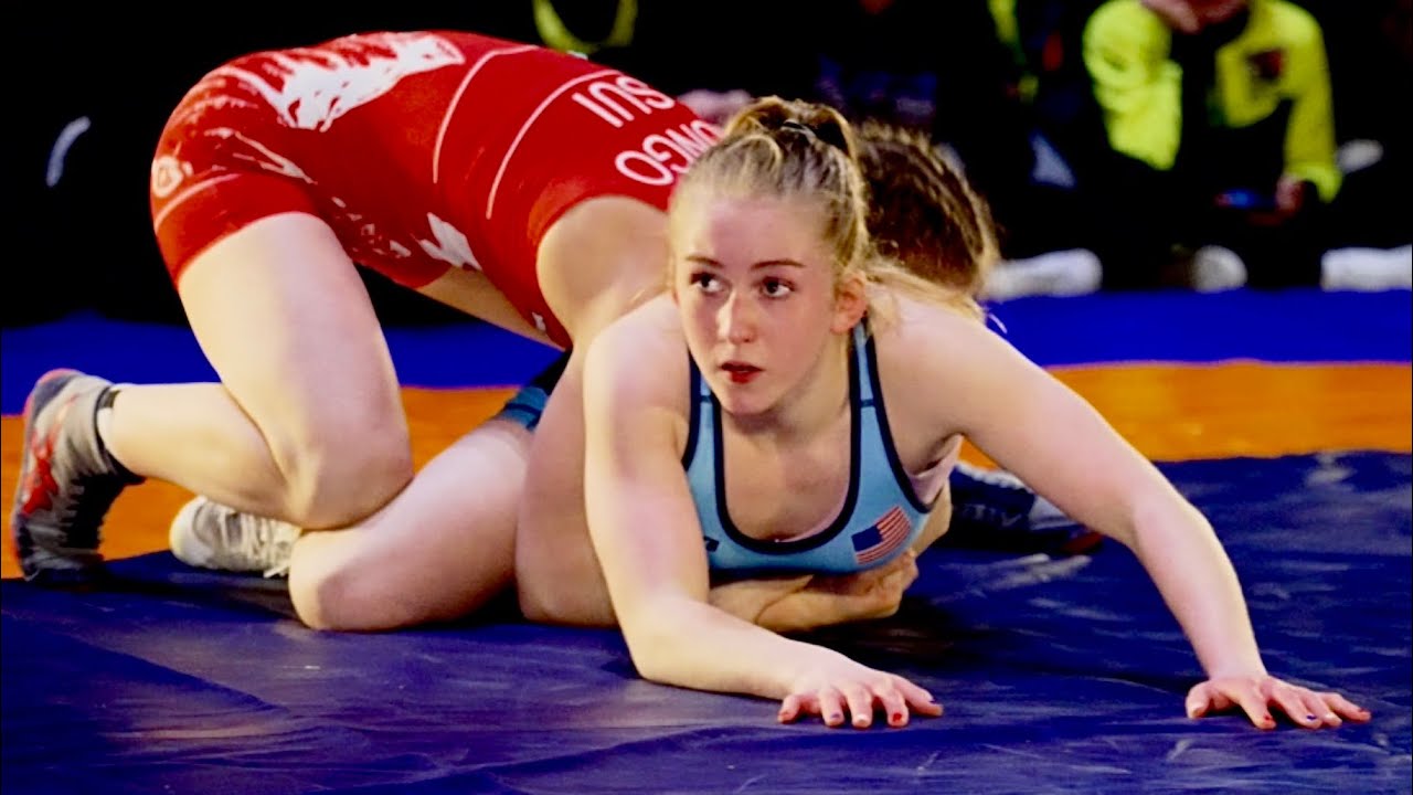 Friendly Europe vs USA. 46kg S. Jungo (SUI) vs T. Stoshak (USA). Women youth wrestling. background