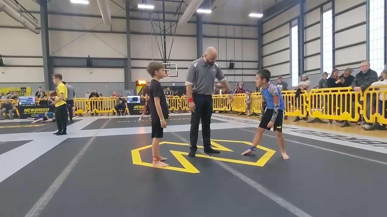 Mark wins with a guillotine