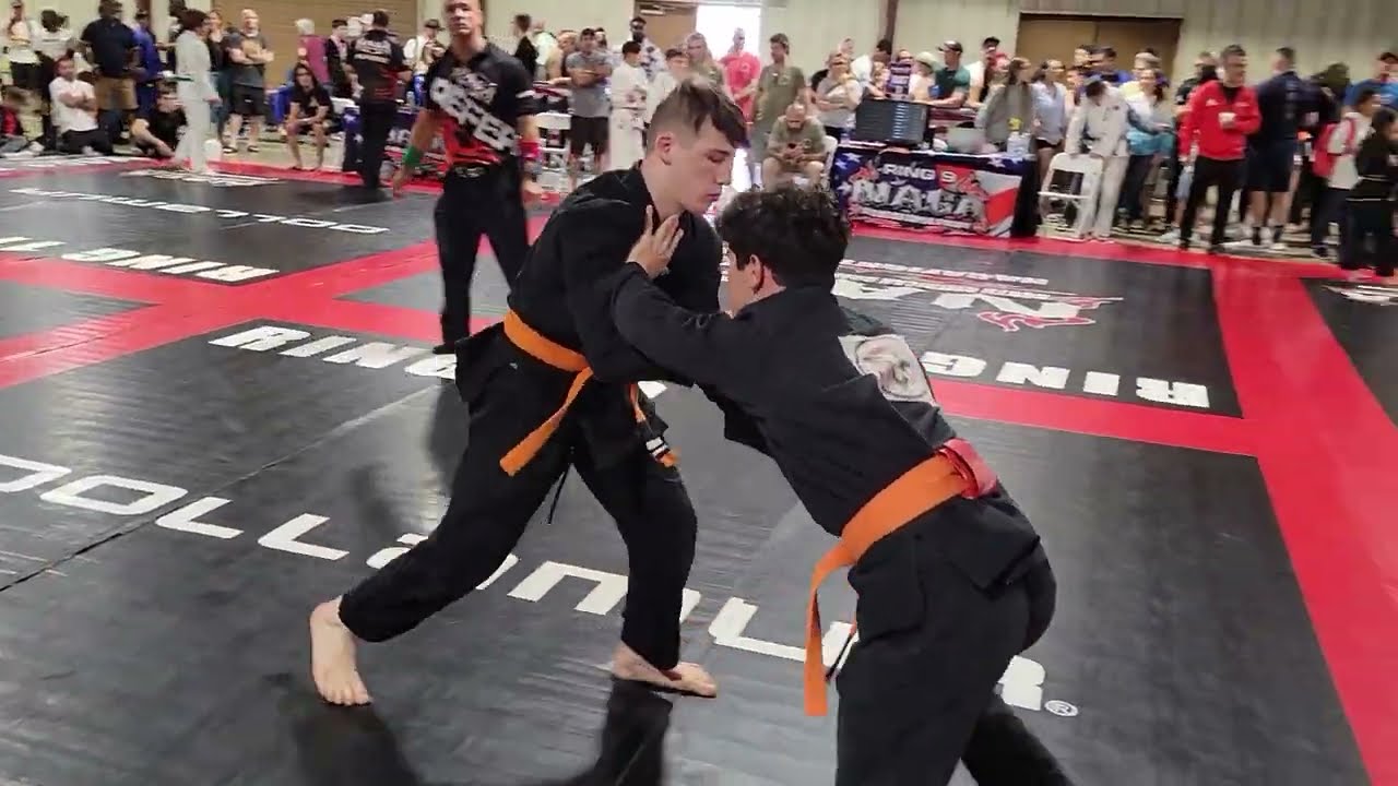 BJJ Orange Belt Pulls Off One Of The Classic Submissions Of Jiu-Jitsu In Competition.