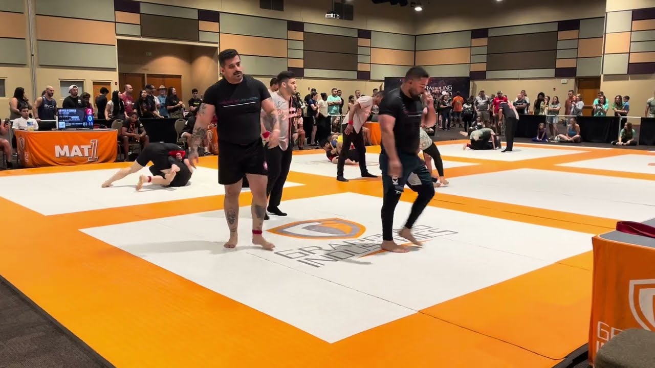 Huge BJJ White Belts Battle In Seattle Washington. Experienced Guys Guess The Submission? background