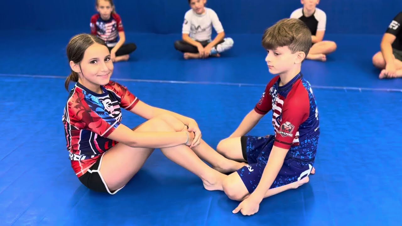 Kids Master the Butterfly Guard at Jiu-Jitsu Summer Camp! background