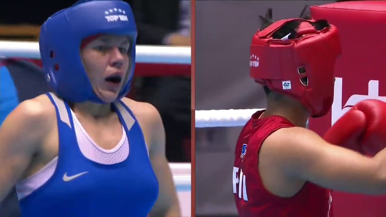 57kg Zinaida Dobrynina RUS Vs Nesty Petecio PHI 2014 World Championships background