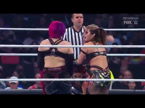 Bayley and Dakota Kai Vs Kabuki Warriors background