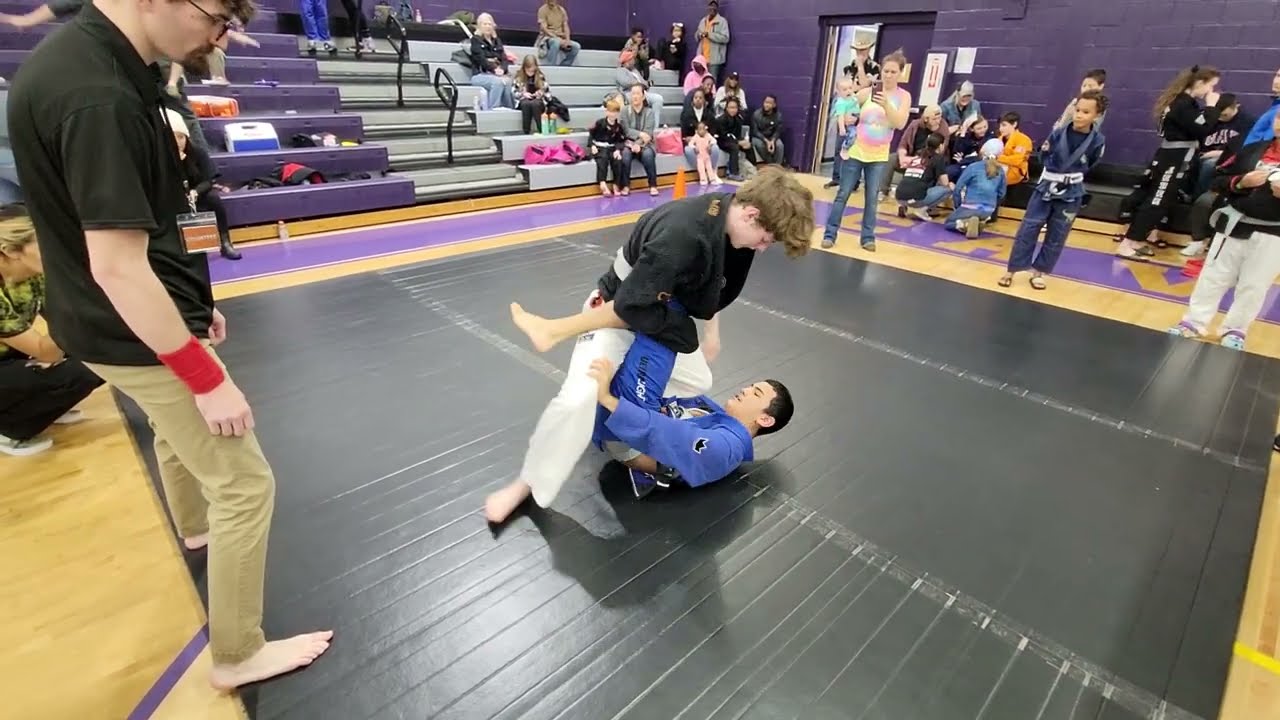 BJJ White Belts Show A Degree Of Skill In Hard Fought Match Guardian Series Competition Savannah GA backdrop