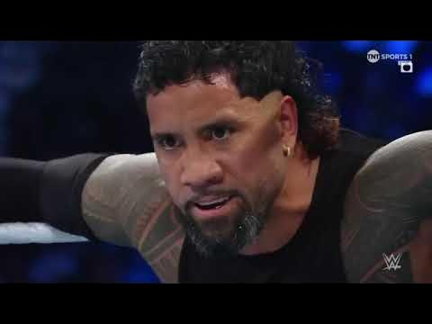 Roman Reigns and Solo Sikoa Attacks Jey Uso background
