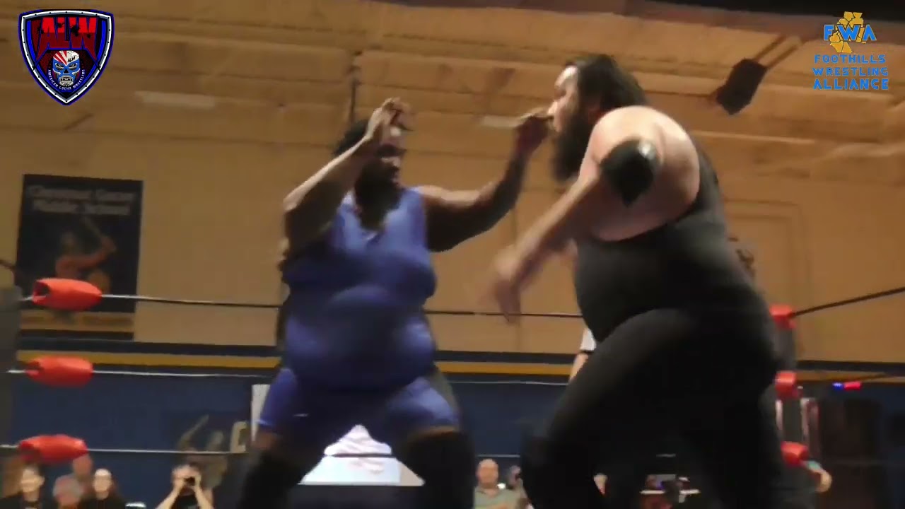 JT Mars vs FWA Heavyweight Champion Aaron Biggs background