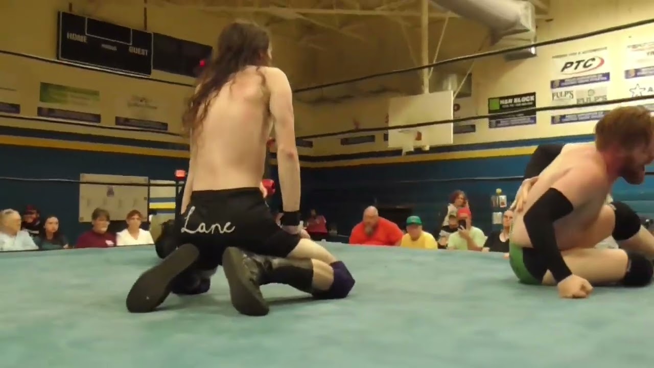 Damon Bryce vs FWA Tag Team Champion Pretty Boy Lane background