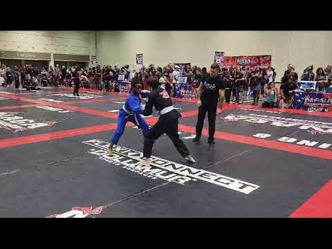 Nice Slam And Questionable Instructions From Coach In BJJ White Belt Match background
