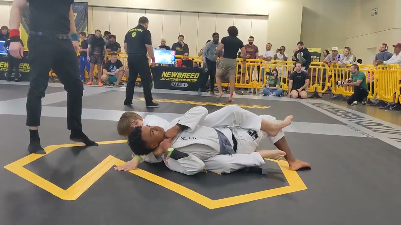 Eli wins by bow and arrow choke