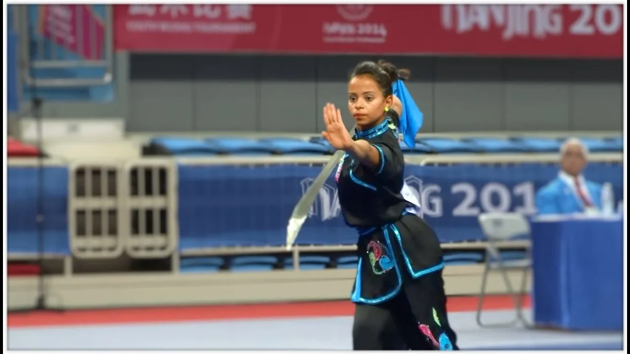 NANJING 2014 Wushu Tournament - Women Daoshu - EGY Hager Mohamed Farahat 9.31 background