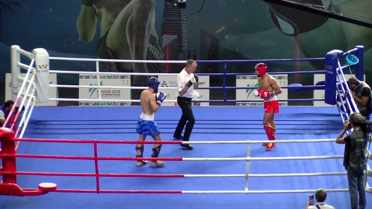 EL JAZOULI Anas MAR v GURBUZCAN ALI Atbarak TUR World Combat Games 2023 background