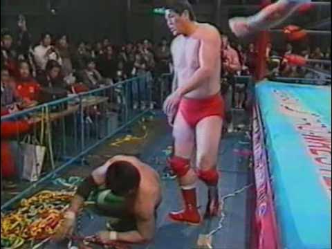 AJPW - Mitsuharu Misawa & Toshiaki Kawada vs Akira Taue & Masanobu Fuchi background