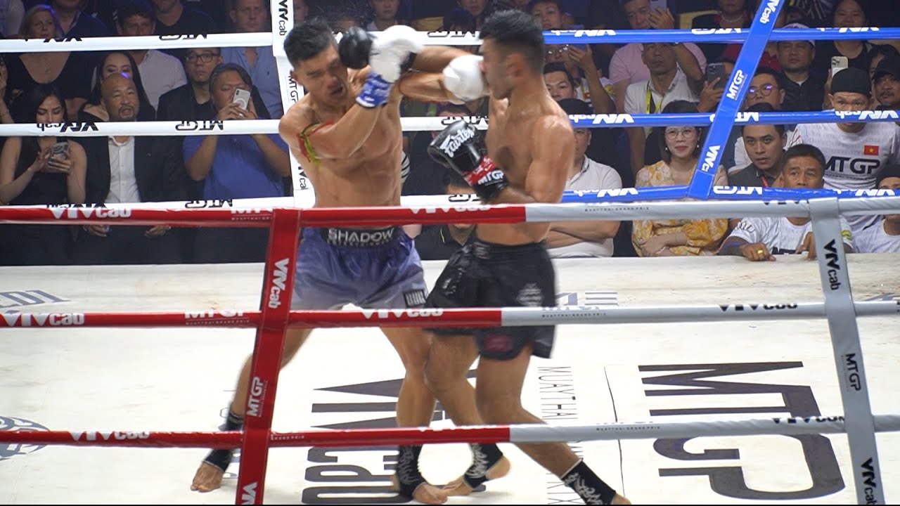 Full trận Trần Quốc Tuấn thắng kịch tính võ sĩ Anh Sherjeel Imran trên sàn đấu Muaythai Grand Prix backdrop