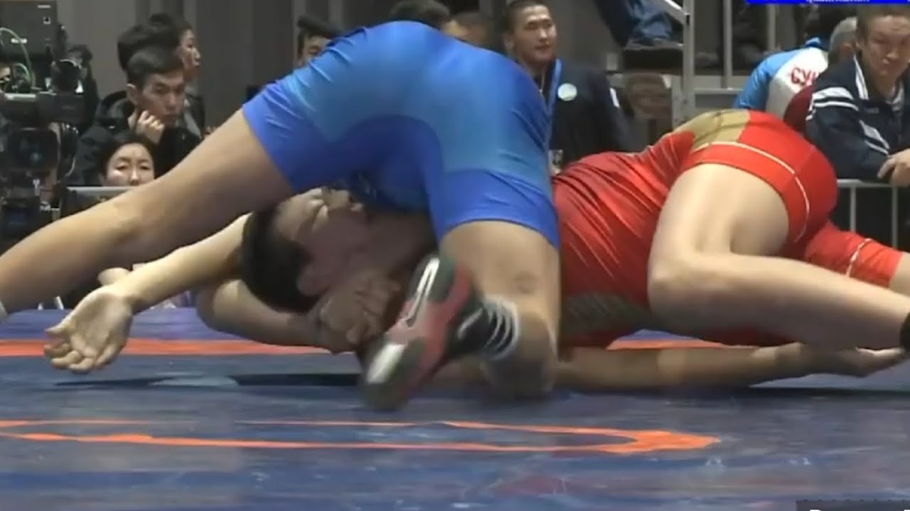 Explosive Freestyle Wrestling Highlights: Unleashing the Power and Precision background