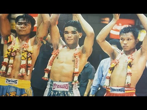 The Golden Era of Muay Thai in Slow Motion background