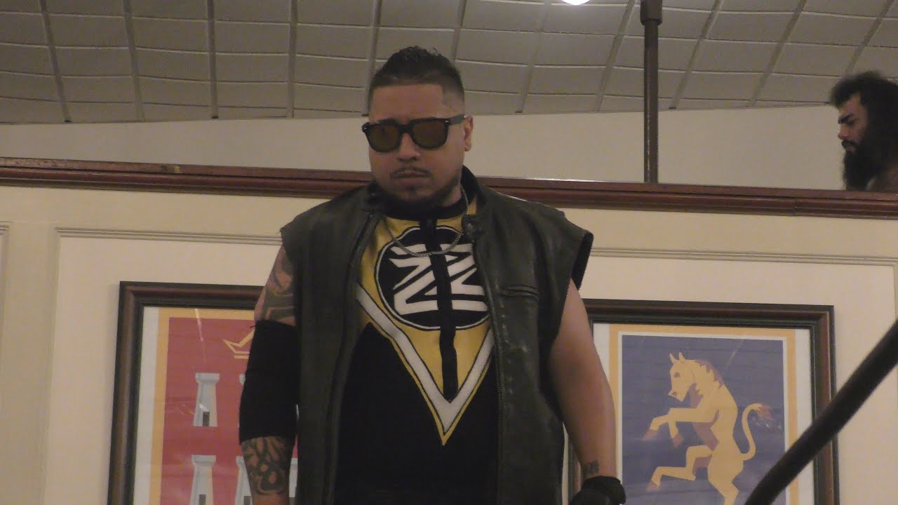 "Colossal" Mike Law vs Superstar Whiplash background
