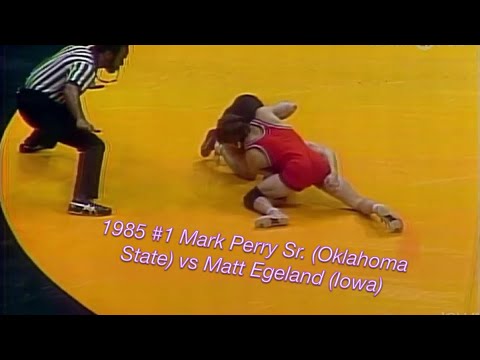 1985 #1 Mark Perry Sr. (Oklahoma State) vs Matt Egeland (Iowa) background