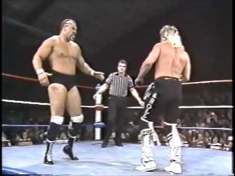 The Rock n Roll Express vs Jake Roberts and The Barbarian. 1985