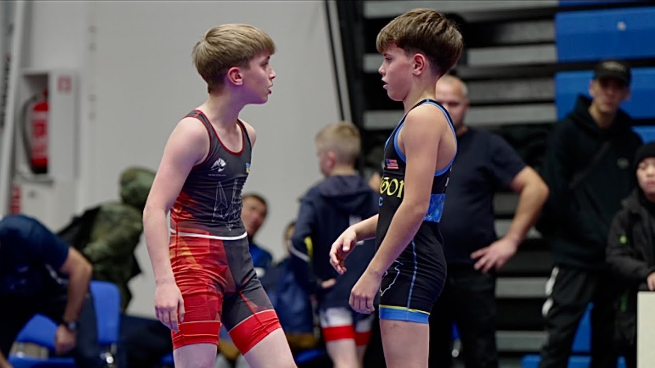 U13 Jasin Amerkhanov (DEN) vs Gleb Galat (EST) 38kg. Greco-roman boys youth wrestling. background