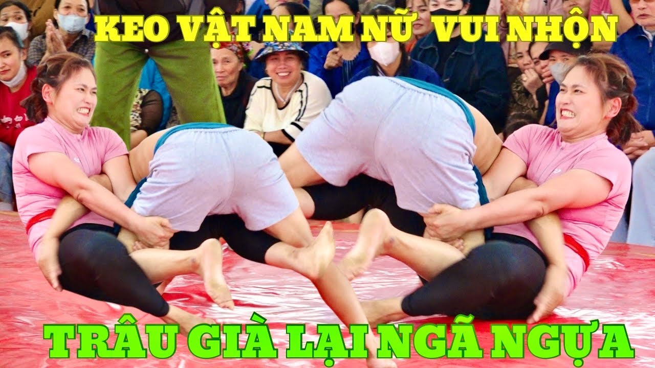 EM NHUNG NGHIÊM XÁ - Lại chén một bác U60 Đấu Vật Traditional Vietnamese Mens & women's Wrestling. background