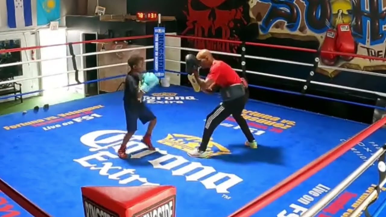 My and little guy my son. Training in A really really Nice Boxing Ring