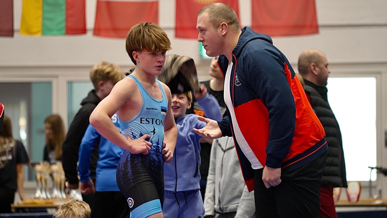 U15 Tymur Dryha (UKR) vs Dominik Samuel (EST) 52kg. Greco-roman boys youth wrestling. background