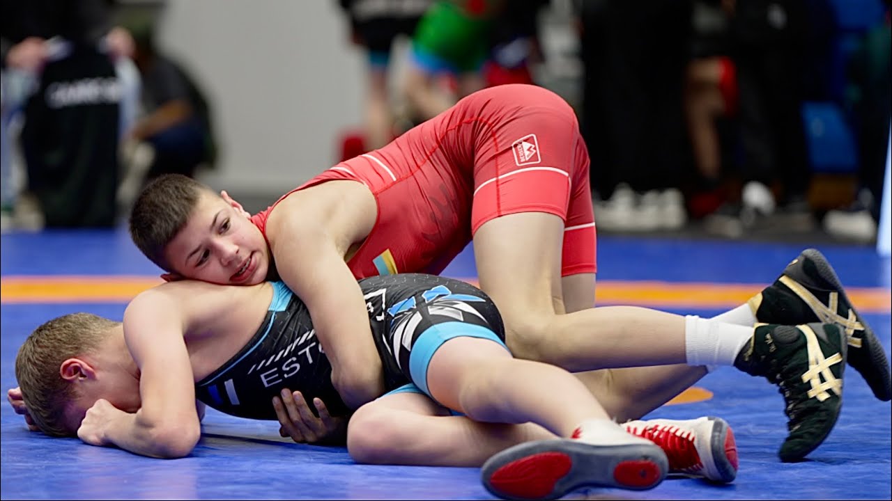 U15 Tymur Dryha (UKR) vs Lauri Sillaots (EST) 52kg. Greco-roman boys youth wrestling. background