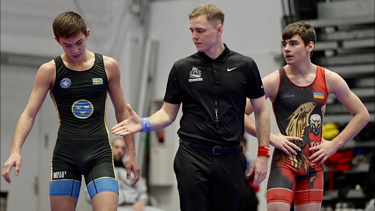 U15 Oleksii Frolov (UKR) vs Pavlos Tounousidis (SWE) 62kg. Greco-roman boys youth wrestling. background