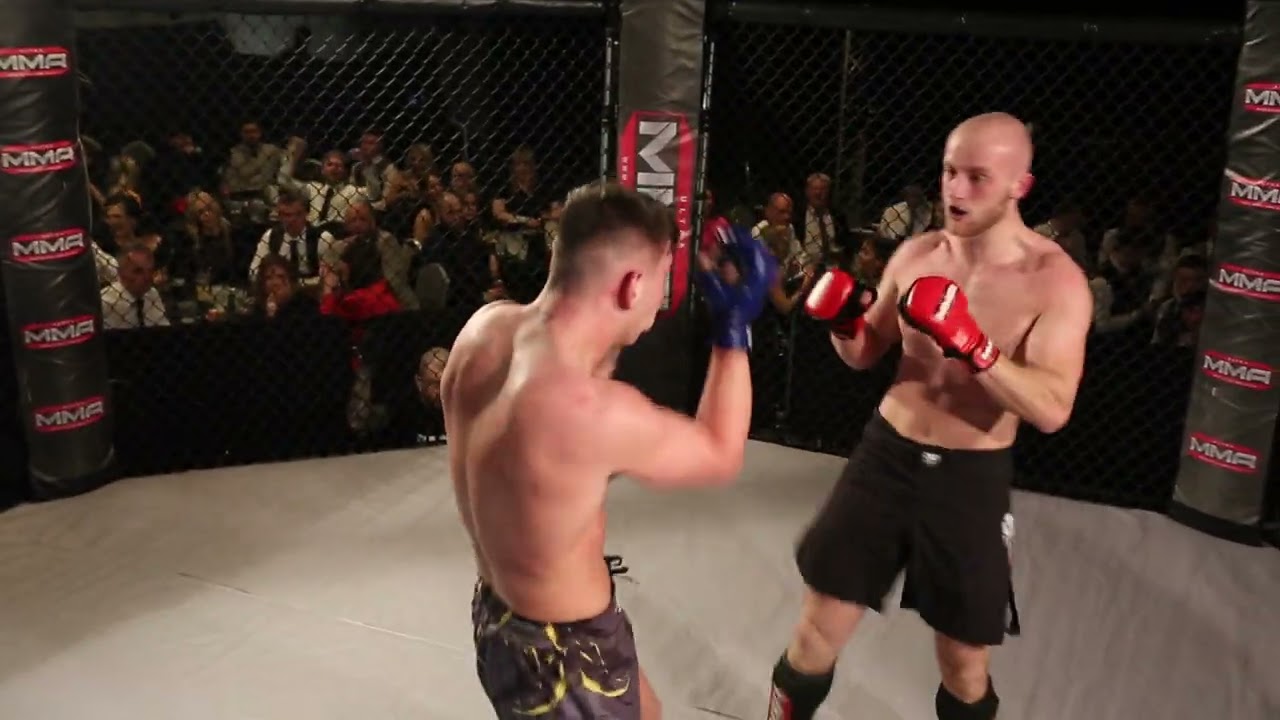 ULTRA MMA GLASGOW 190424 FIGHT 16 FRASER MITCHELL VS DECLAN DOCHERTY background