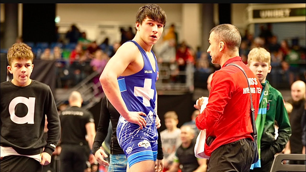 U20 Giorgi Abulashvili (GEO) vs Gino Gugolz (SUI) 65kg. Freestyle men wrestling. B-cam-man background