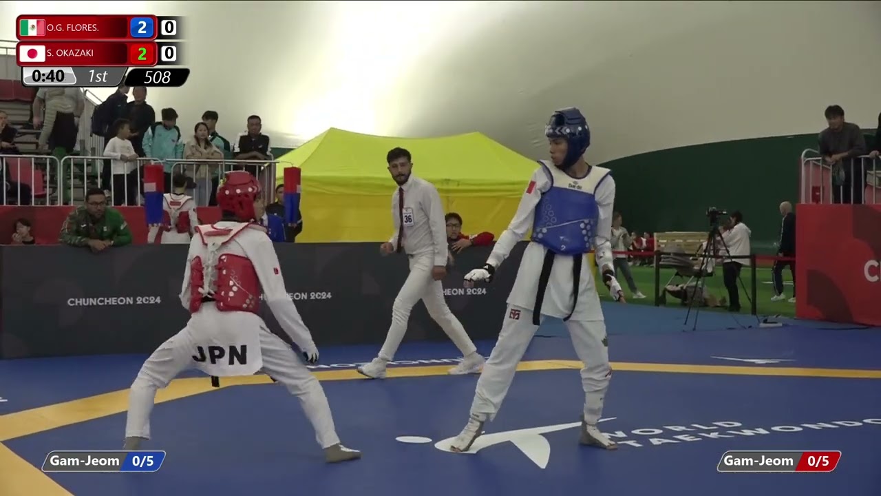 508 Round of 64 Men 51kg MEX O G FLORES JPN S OKAZAKI background
