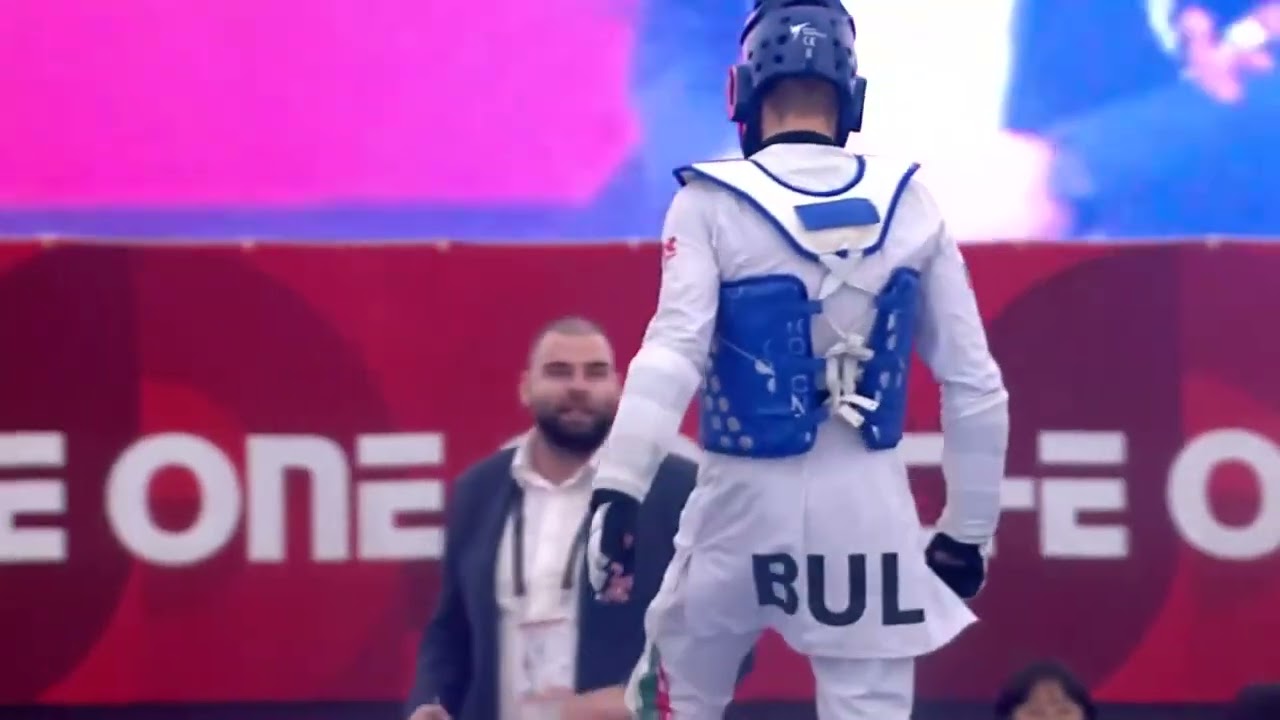 329 Semi Final Men 63kg BUL MITKOV S A ZE SALIMOV V background