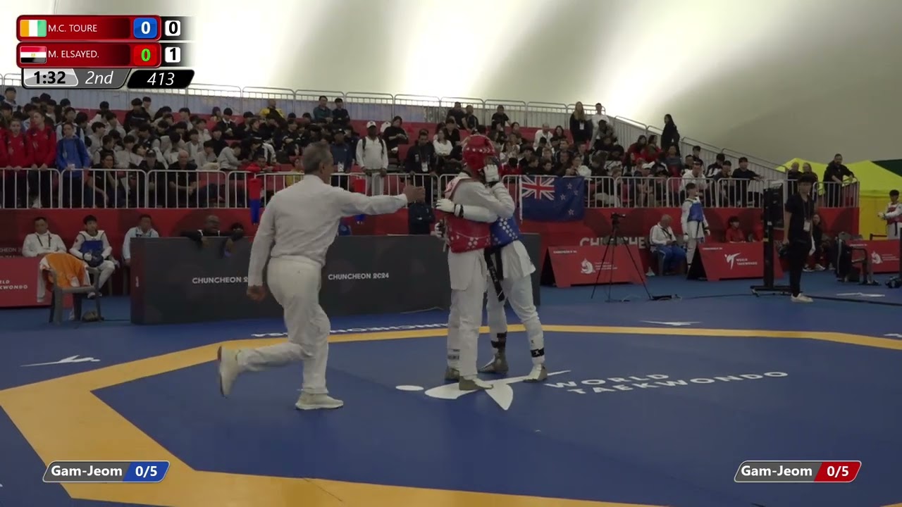 413 Round of 32 Men 59kg CIV M C TOURE EGY M ELSAYED background