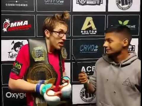 Kurtis Campbell post-fight interview at FCC:27 after winning his 3rd amateur title background