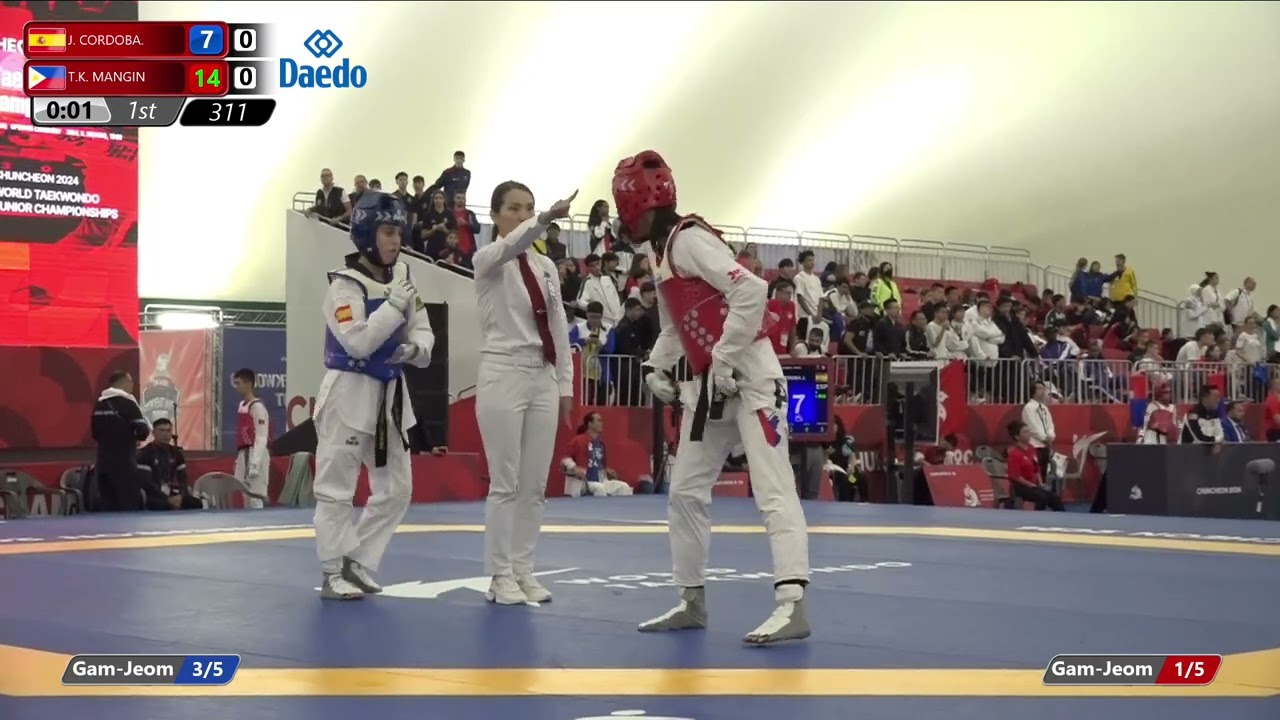 311 Round of 32 Women 49kg ESP J CORDOBA PHI T K MANGIN background