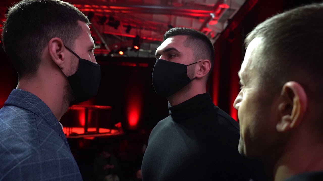 FEA KICKBOXING RESET . Weigh in and Face off view from outside. background