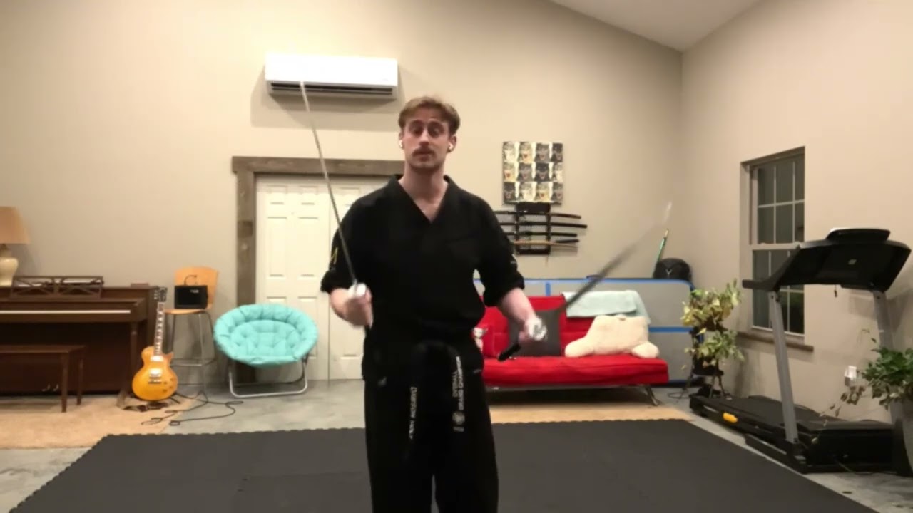 Forward and Backward Rolls with the Sword by Dawson Holt - The Skill Zone background