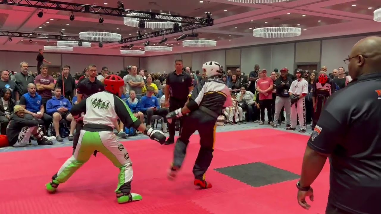 Team Paul Mitchell vs Team Revolution Men's Team Sparring - Diamond Nationals 2024 background