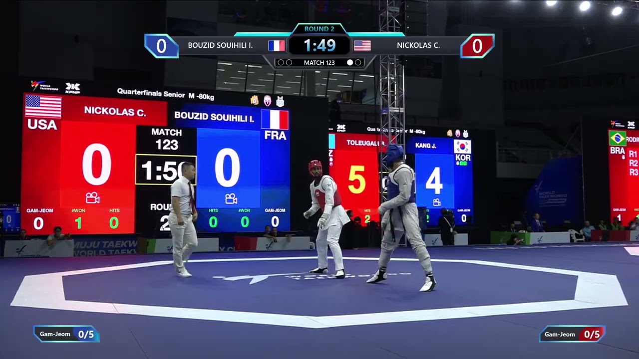 123 Quarterfinals M 80kg FRA BOUZID SOUIHILI I USA NICKOLAS C PGM background